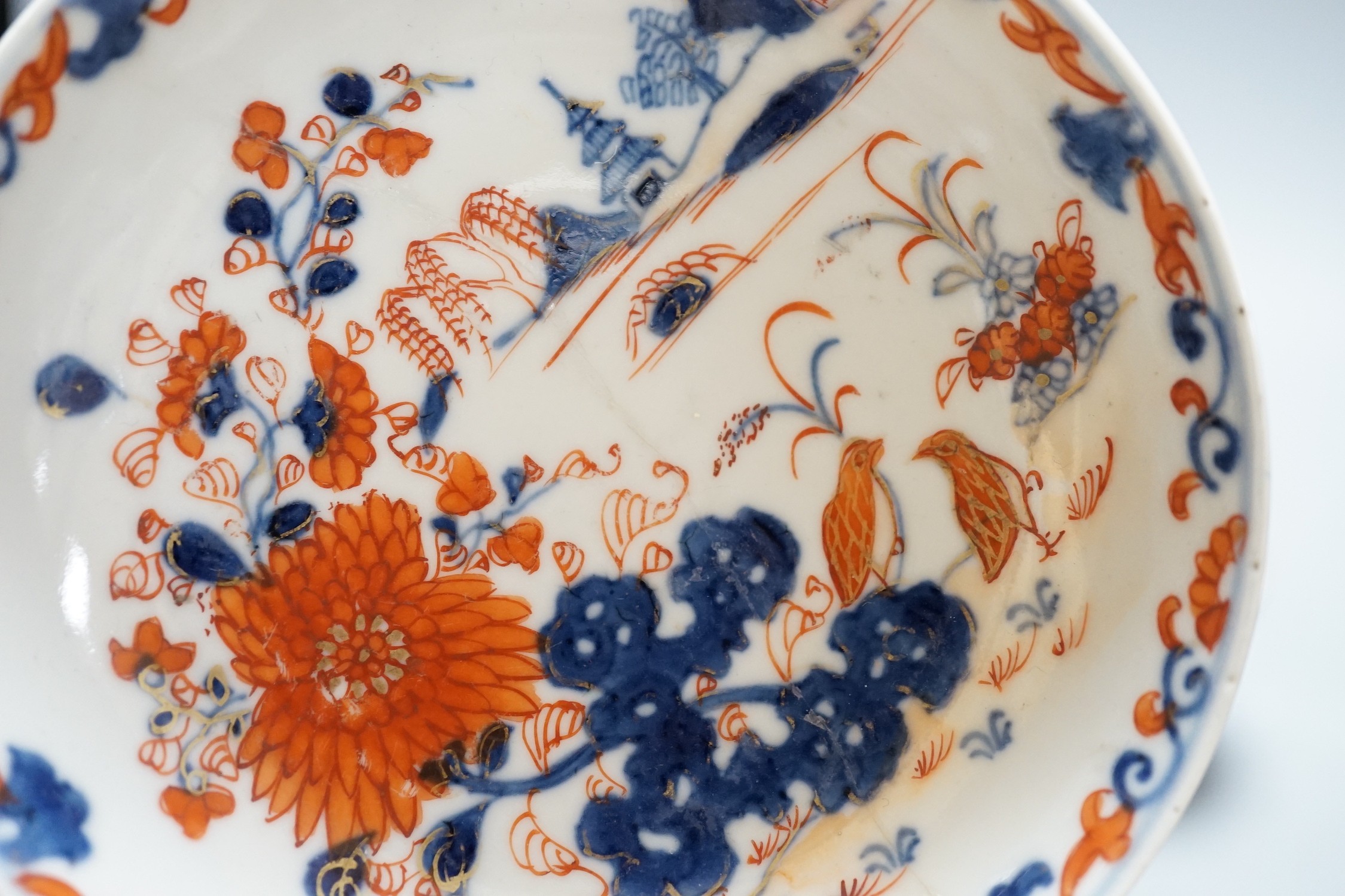 An 18th century Chinese Imari pattern saucer, a small Korean vase and two other pieces